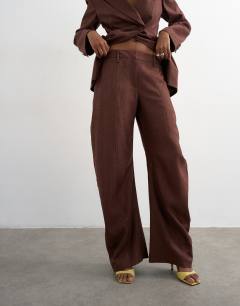 Model wearing Linen blend co ord occasion barrel leg trouser in chocolate
