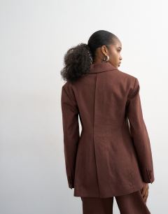 Model wearing Linen blend co ord occasion strong shoulder cinched waist blazer in chocolate