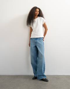 Model wearing Linen blend fitted short sleeve henley in white