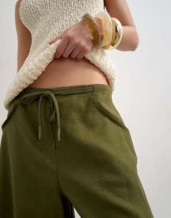 Model wearing Linen cargo trouser in khaki