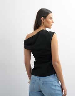 Model wearing Linen cinched waist asymmetric twist shoulder top in black