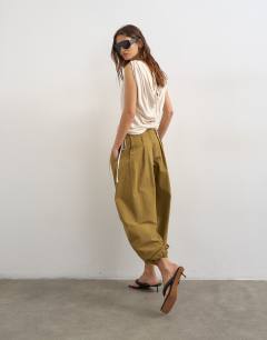 Model wearing Linen look cowl ruched side top in cream