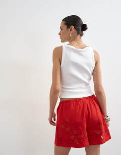 Model wearing Linen mini short with drawcord in red