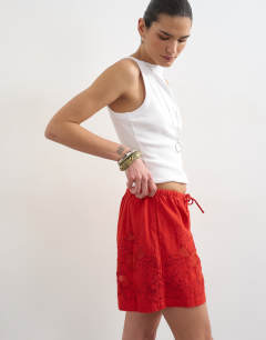Model wearing Linen mini short with drawcord in red