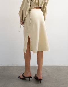Model wearing Linen rich 90s length skirt in ecru