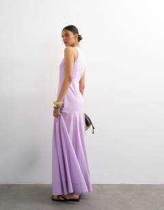 Model wearing Linen rich dropped waist full circle hem midi dress in lilac