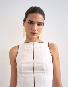 Model wearing Linen rich mini shift dress in ecru with top stitch