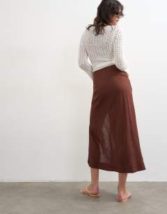 Model wearing Linen sarong maxi skirt in brown