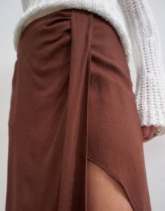 Model wearing Linen sarong maxi skirt in brown