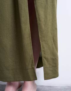 Model wearing Linen sarong maxi skirt in green