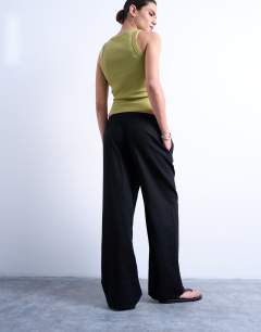 Model wearing Linen straight leg trouser with deep cuff in black