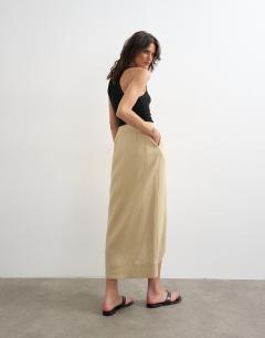 Model wearing Linen wrap maxi skirt in taupe