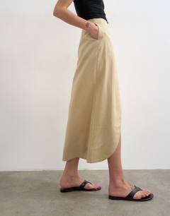 Model wearing Linen wrap maxi skirt in taupe