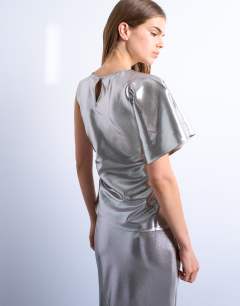 Model wearing Liquid look metallic ruched side top in silver