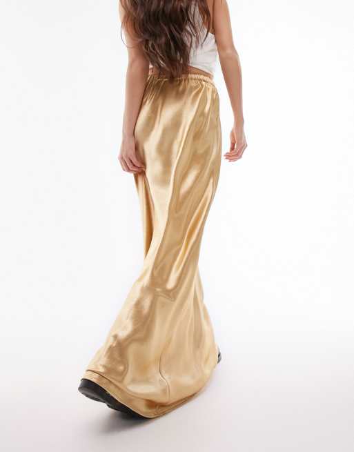 Topshop liquid look satin bias maxi skirt in gold