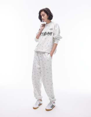 lisboa floral print cuffed sweatpants in ecru - part of a set-White