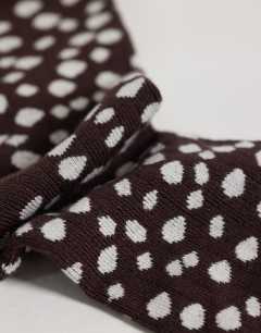 Model wearing Lola viscose socks in chocolate deer print