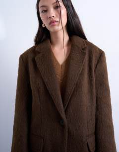 Model wearing Long brushed one button blazer coat with wool in chocolate