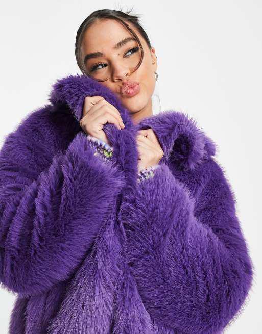 Purple fur coat store with hood