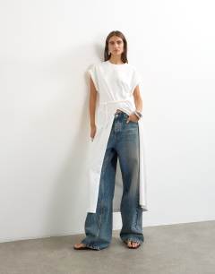 Model wearing Long line twist tunic top in white
