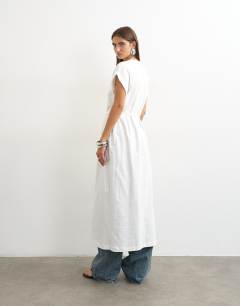 Model wearing Long line twist tunic top in white