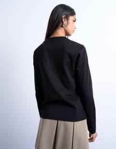 Model wearing Long sleeve boxy tee in black
