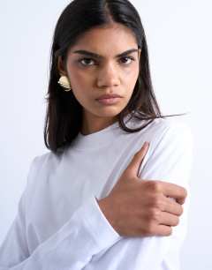 Model wearing Long sleeve boxy tee in white