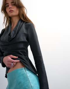 Model wearing Long sleeve cowl neck curpro top in black