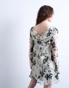 Model wearing Long sleeve cowl neck mini tea dress in mono floral