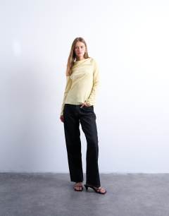Model wearing Long sleeve drape neck velvet top in buttermilk