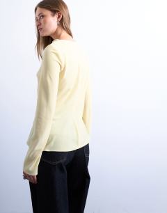 Model wearing Long sleeve drape neck velvet top in buttermilk