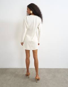 Model wearing Long sleeve high neck tuck side mini dress in off white