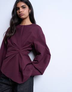 Long sleeve pleat front top in burgundy