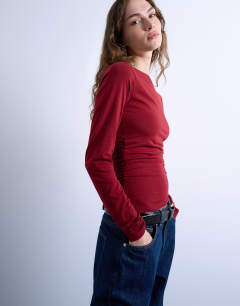Long sleeve ruched slash neck top in dark red