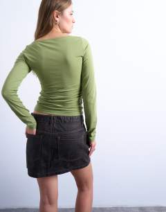 Model wearing Long sleeve ruched slash neck top in green