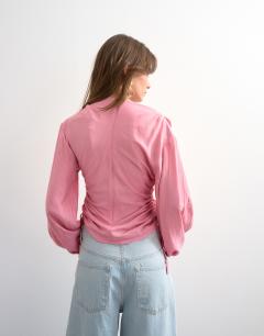 Model wearing Long sleeve ruched tie side top in pink