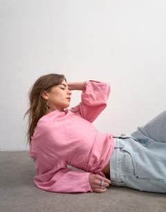 Model wearing Long sleeve ruched tie side top in pink