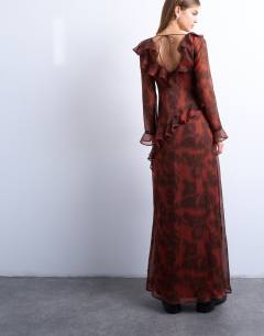 Model wearing Long sleeve ruffle maxi dress in blurred rusty floral