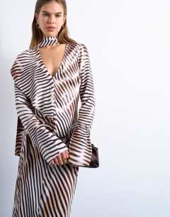 Model wearing Long sleeve ruffle maxi dress with scarf wrap detail in abstract stripe