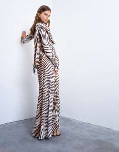 Model wearing Long sleeve ruffle maxi dress with scarf wrap detail in abstract stripe