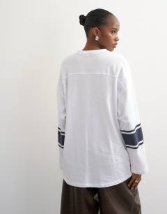 Model wearing Long sleeve skater '92' graphic t-shirt in white