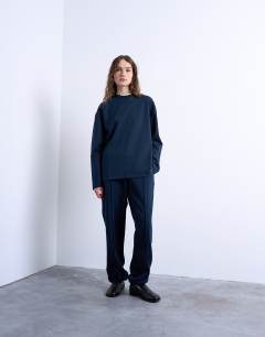 Model wearing Long sleeve skater tee in navy 