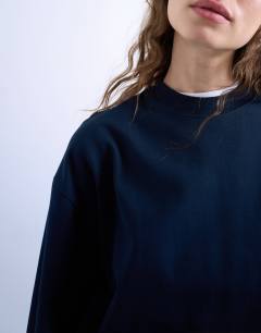 Model wearing Long sleeve skater tee in navy 