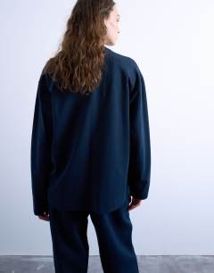 Model wearing Long sleeve skater tee in navy 