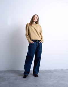 Model wearing Long sleeve skater tee in pale khaki