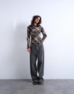 Model wearing Long sleeve top in check print