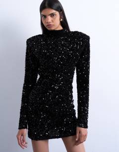 Model wearing Long sleeve velvet sequin mini dress with shoulder pads in black