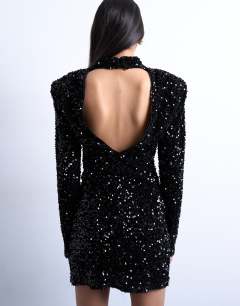 Model wearing Long sleeve velvet sequin mini dress with shoulder pads in black