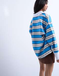 Model wearing Long sleeve woven polo top in blue stripe