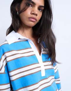 Model wearing Long sleeve woven polo top in blue stripe